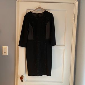 Limited long sleeve sheath dress.